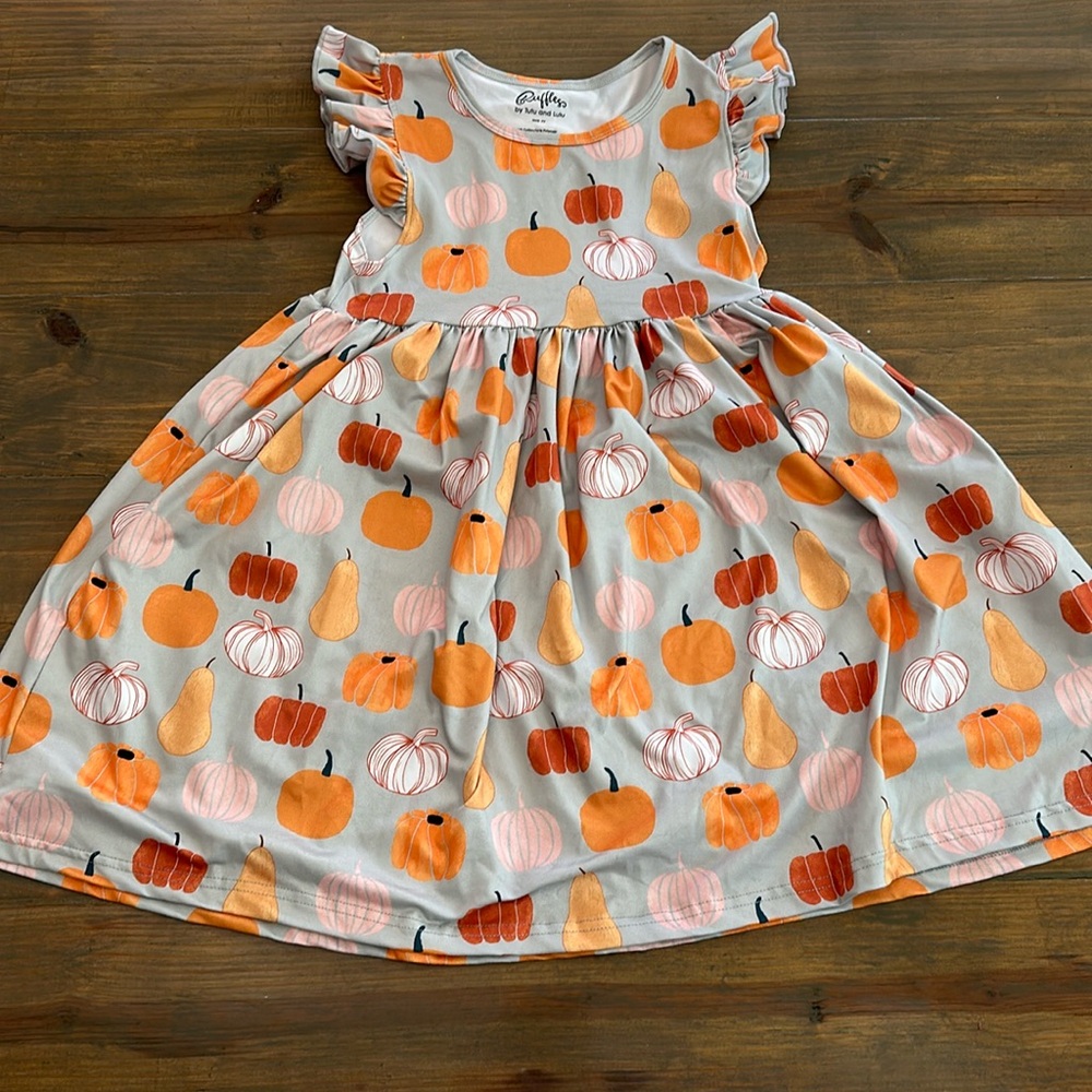 Ruffles fall pumpkin dress. Size 7Y.